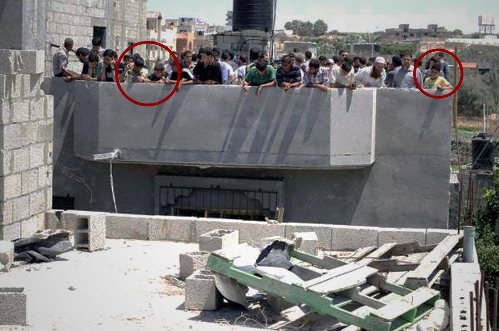 Hamas incita os civis, incluindo crianças, para ficarem no telhado de um edifício onde as IDF alertaram para um ataque iminente