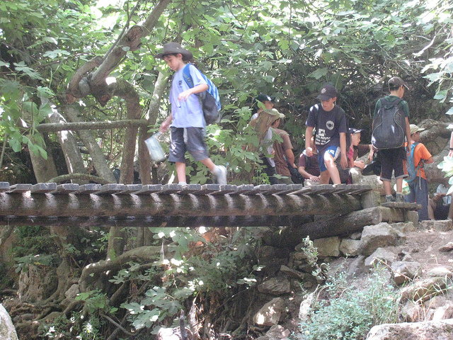 Children crossing a bridge at Nahal Amud in the Galilee