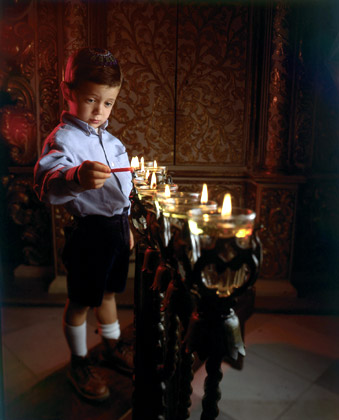 Lighting Hanukah candles