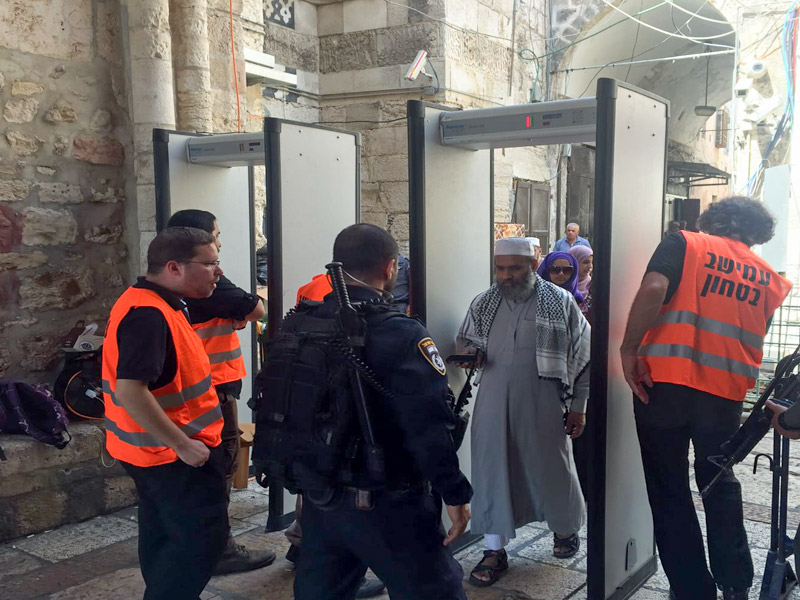 Worshipper going through Temple Mount security check