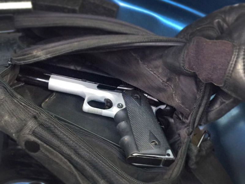 A pistol that was among the weapons seized.