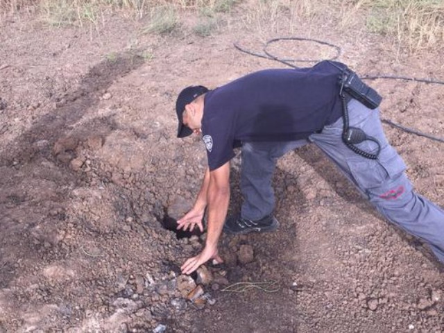 Police bomb disposal experts find remains of Grad rocket fired from Gaza on May 26, 2015