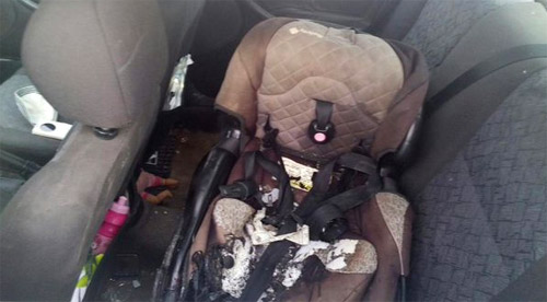 Infant seat in car hit by firebomb