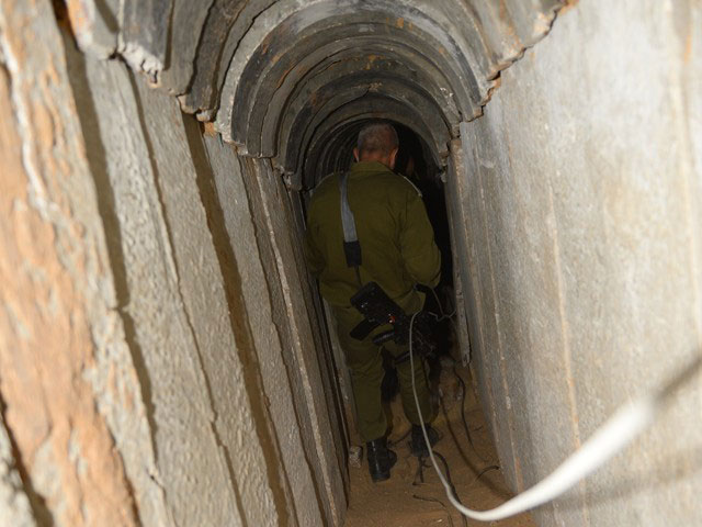 Soldier investigates the Gazan terror tunnel leading into Israeli civilian communities