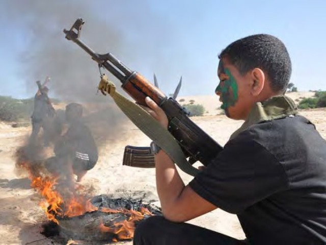 Children learn how to fire automatic weapons at a Palestinian Islamic Jihad summer camp