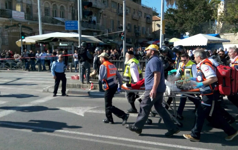 Police and medics at the scene of terror attack outside Damascus Gate (Magen David Adom)