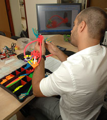 Amir Asor creating at his office