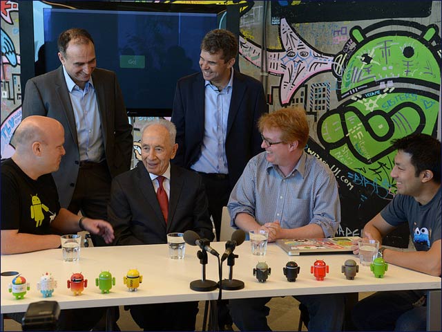 Google developers from Silicon Valley, right, welcome President Peres to the launch of Code Lab