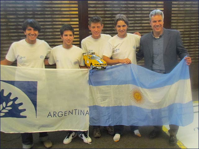 Avi Ganon, right, with the winning Robotraffic delegation from Argentina