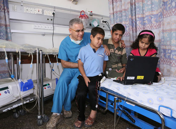 Mahdi Tarabia, Head Nurse of the Pediatric Nephrology Unit, with the kids