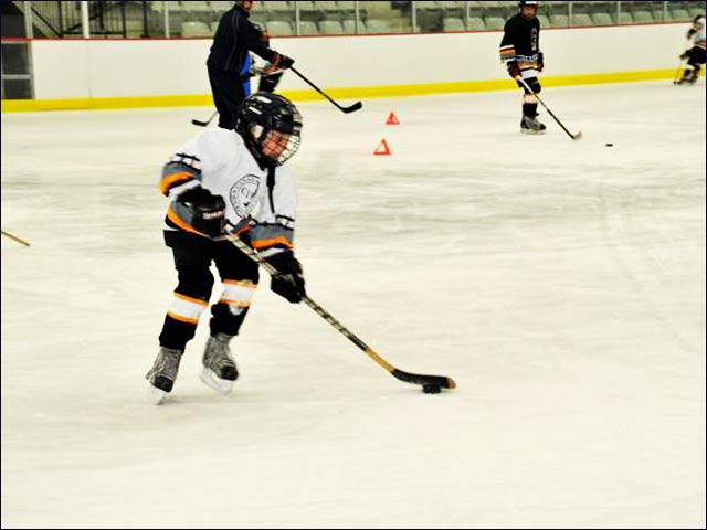 Shachar Ben-Haim, 10, practicing on the ice