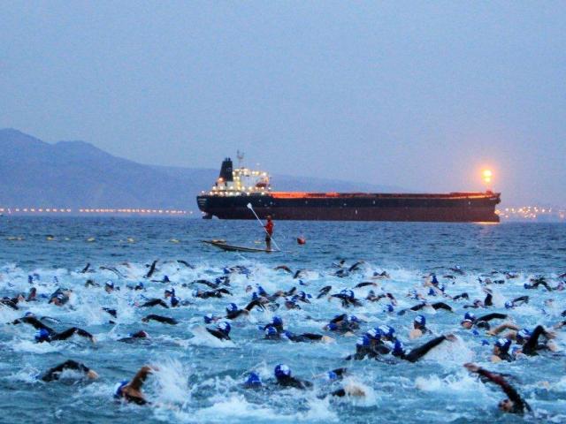 Israman competitors swimming in the Red Sea