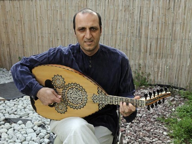 Dr. Yehuda Kamari playing the oud