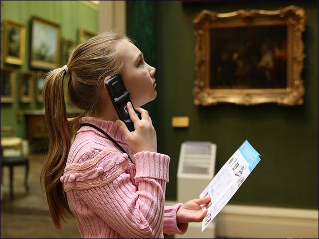 A child using Acoustiguide’s Opus multimedia systems at the Wallace Collection, London