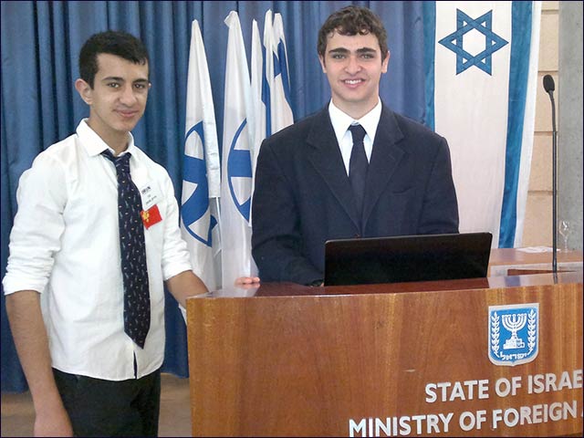 Leyada High School students Sar Famami, left, and Eli Brown ready to debate.