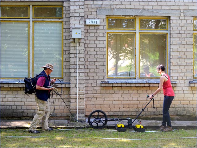 Prof. Harry Jol & Nicole Awad conducting a Ground Penetrating Radar survey at the site of the Great Synagogue of Vilna in Lithuania.