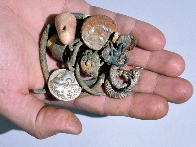 Cache of silver objects: two coins of Alexander of Macedon, rings, bracelets, earrings, and a small stone weight