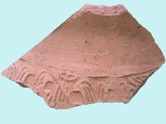 Fragment of cylinder seal impression found at Bet Ha-'Emeq site