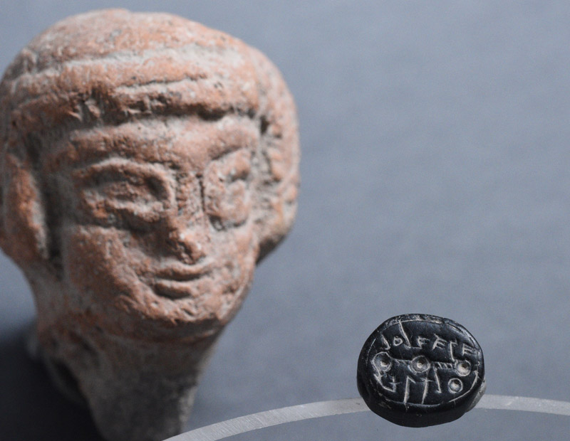 The Elihana seal and figurine of a woman from the First Temple period symbolizing fertility, also uncovered at the site