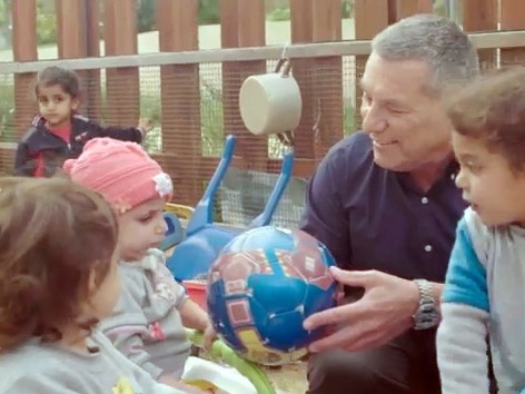 Doron Almog with disabled children at Aleh Negev-Nachalat Eran