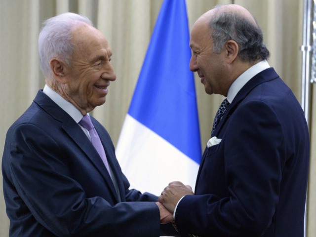 President Peres meets with French FM Fabius