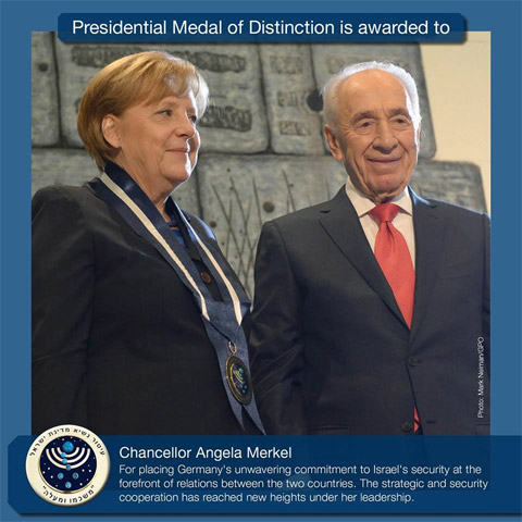 President Peres conferred Medal of Distinction on German Chancellor Merkel