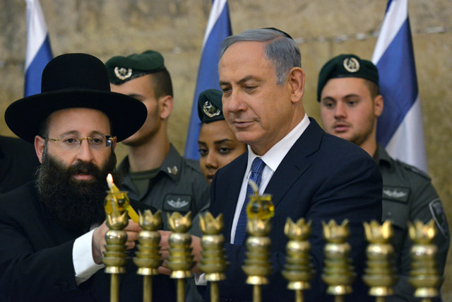 PM Netanyahu lights the first Chanukah candle at the Western Wall