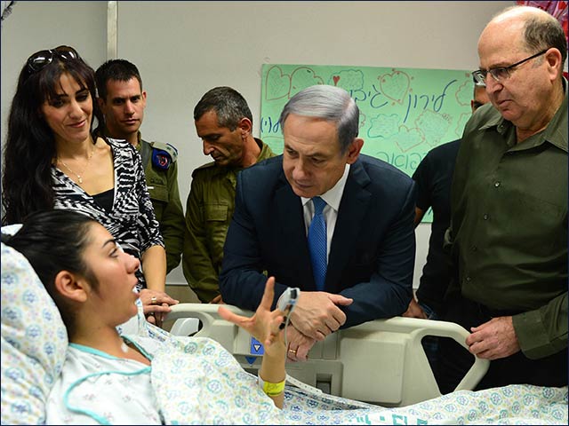 PM Netanyahu and DM Yaalon visiting wounded victims at Hadassah-Ein Kerem Hospital in Jerusalem