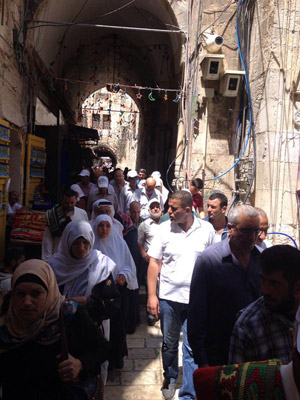 Thousands of people make their way to the Temple Mount for first Friday prayers of Ramadan 