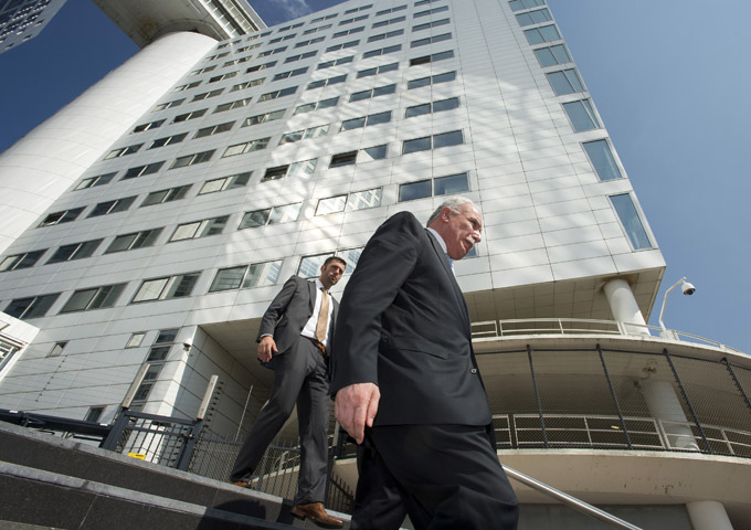 Palestinian Foreign Minister Riad al-Malki leaves the ICC at the Hague, August 2014