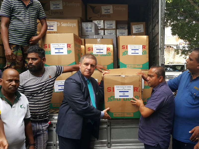 Ambassador Carmon presenting the shipment to the Sri Lankan authorities