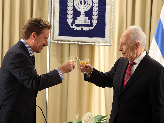 President Peres with Swiss Ambassador Andreas Bau