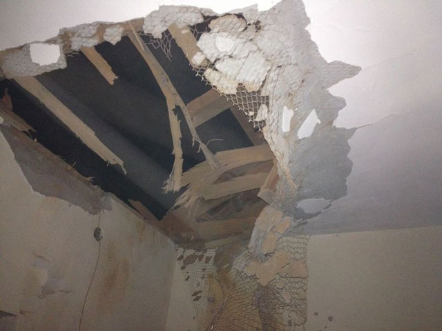 Ceiling of a home in Sderot which suffered a direct rocket hit