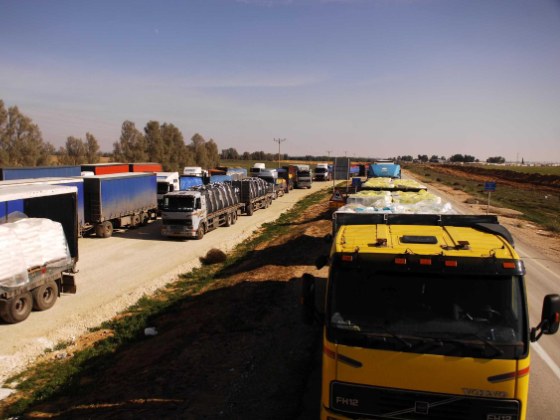 Trucks carrying goods from Israel to Gaza