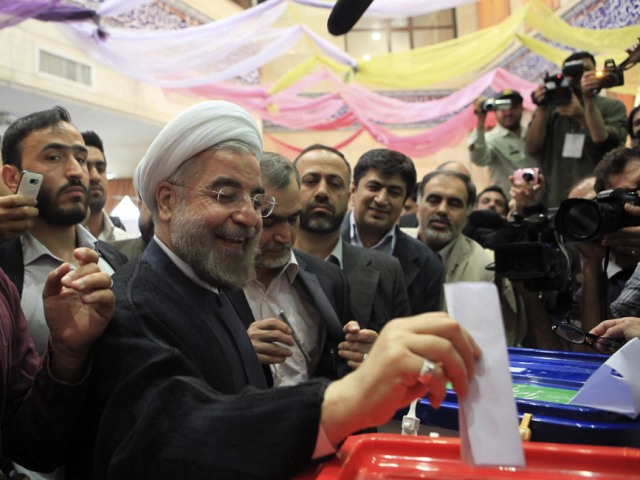 Presidential candidate Hassan Rohani casts his ballot at Iranian presidential election in Tehran