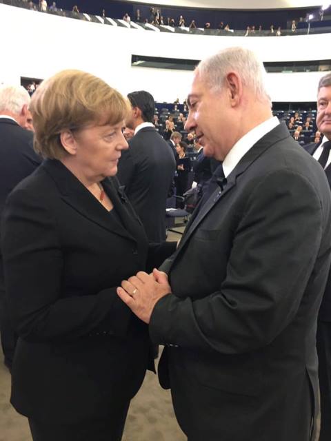 Bundeskanzlerin Angela Merkel und Premierminister Benjamin Netanyahu am Rande der Trauerfeier für Helmut Kohl