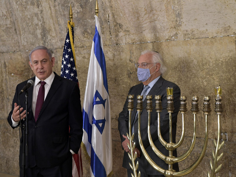 PM Netanyahu with US Ambassador David Friedman at the Western Wall at ceremony of the lighting of the first Chanukah candle