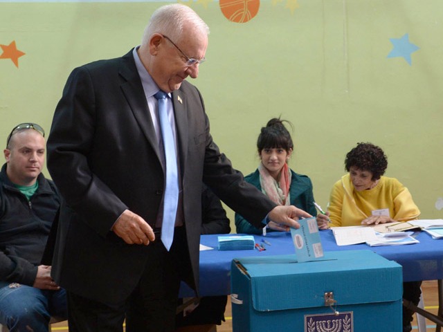 President Rivlin casts his vote for the 20th Knesset