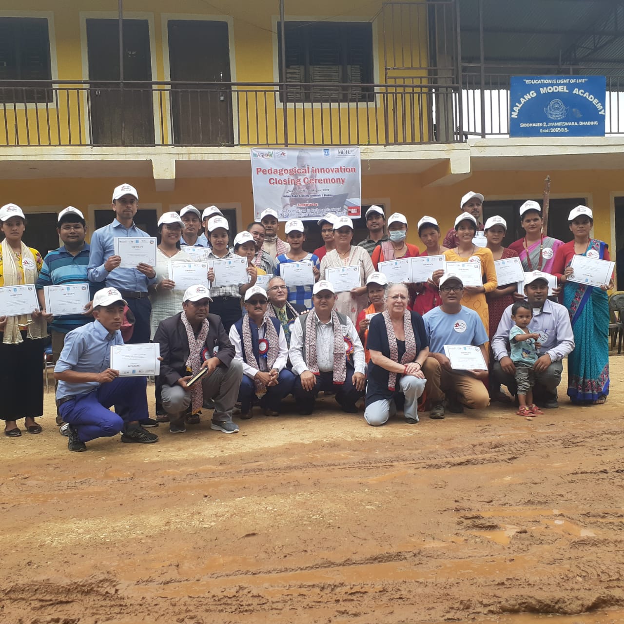 The Honourable Minister, Ambassador and Trainer with Participants.jpg