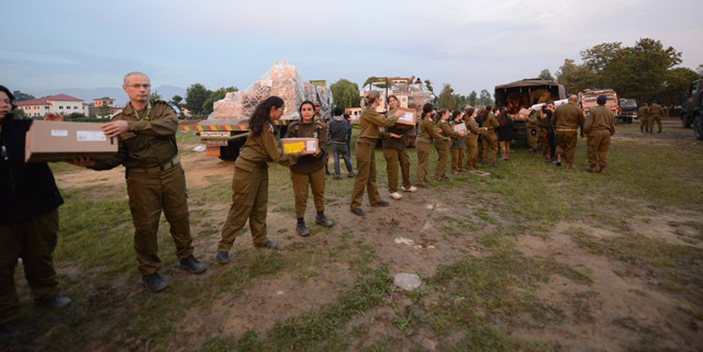 Unloading supplies for the field hospital