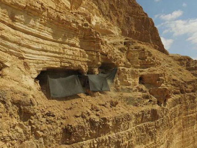 The cave where the archaeological excavation is being conducted is situated 80 meters from the top of the cliff and 250 meters above the base of the wadi