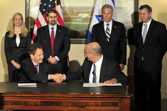 Director General of the Finance Ministry of Israel Doron Cohen, and United States Secretary of the Treasury Timothy Geithner sign a Memorandum of Understanding (MOU) establishing a new framework for administering the recently extended U.S.-Israel Loan Gua