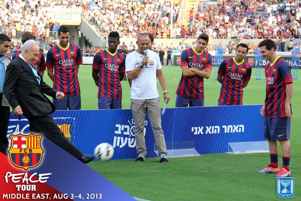 Peres kicks the ball.jpg